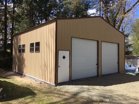 prefab metal garages vs wood